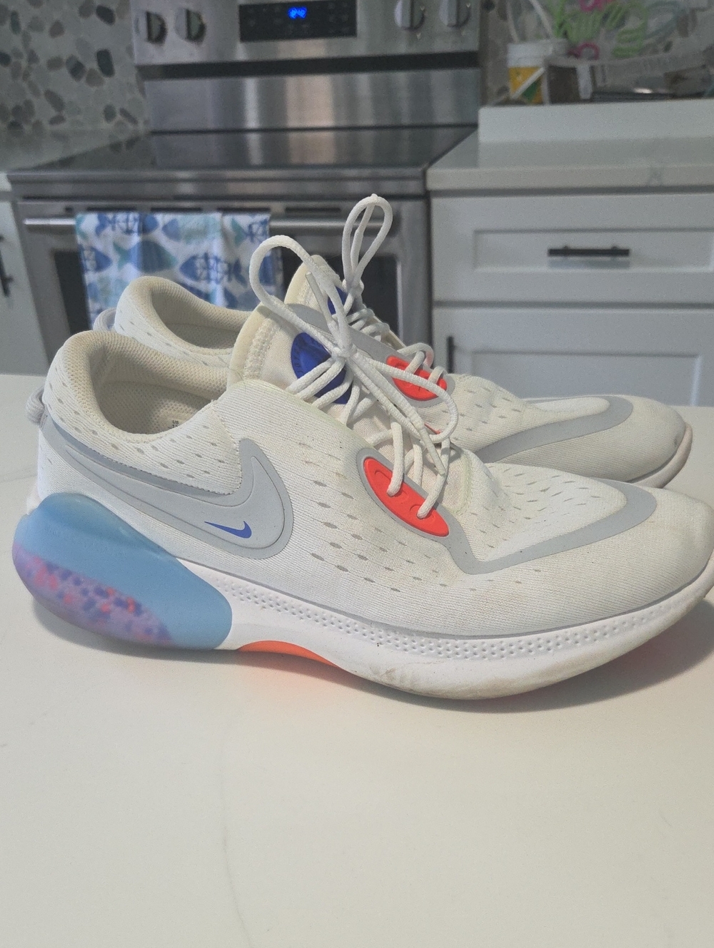 Nike men's White Athletic Sneakers with Blue and Coral Accents